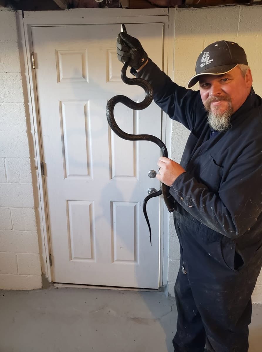 Cory Holder, NC Licensed Home Inspector and owner of SureLock Home Inspections, on the job during an inspection
